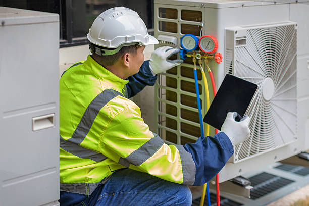 Professional Hvac technician working in Lake City, PA